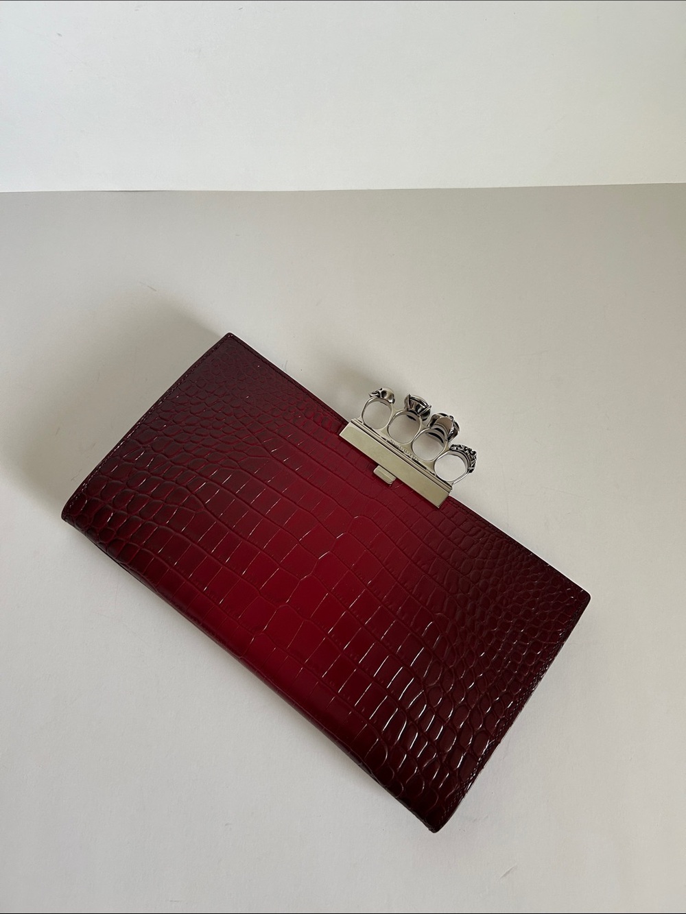 Alexander McQueen Deep Burgundy Croc-Embossed Knuckle Clutch with Silver Rings